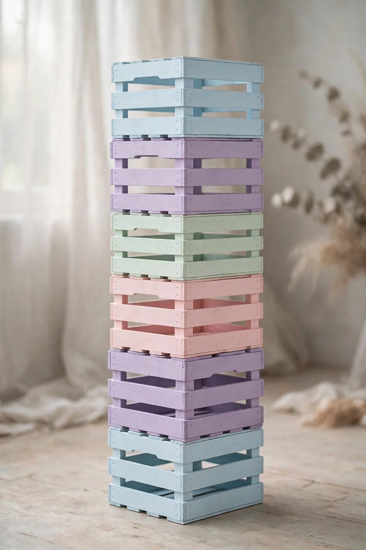 Pastel painted wooden crates stacked